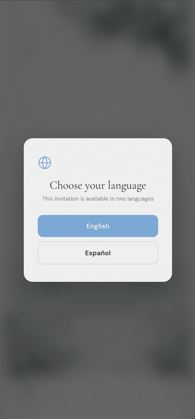 Bilingual wedding invitation language picker popup letting guests choose between English and Spanish