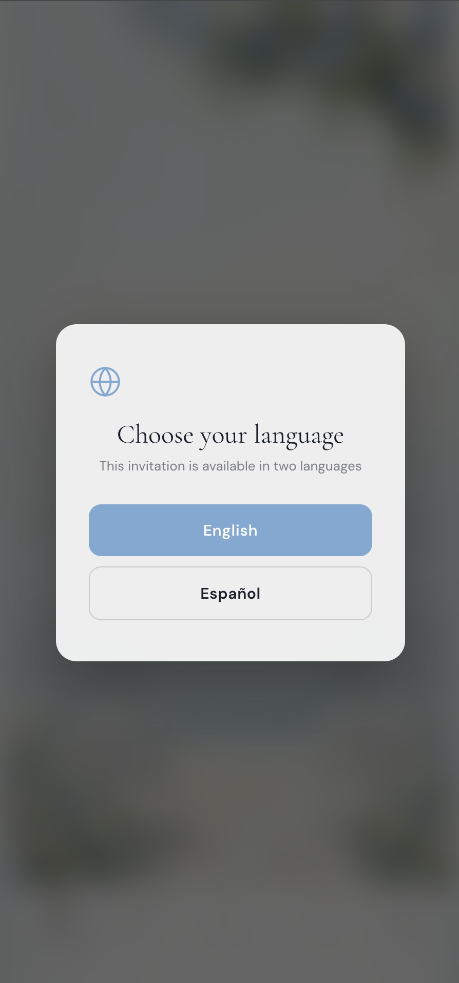 Bilingual wedding invitation language picker popup showing Choose your language with English and Español buttons after the cinematic opening animation