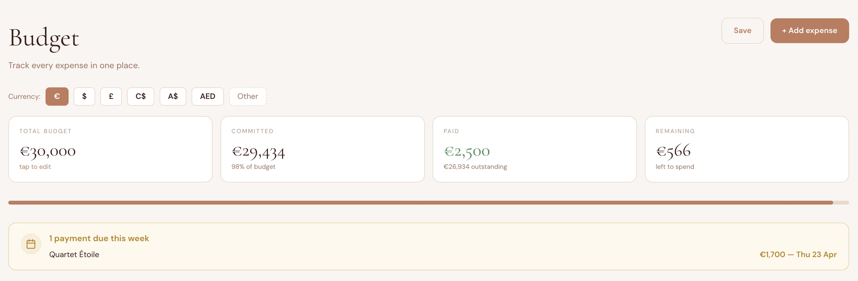 Wedding budget alert showing upcoming vendor payment due this week with amber reminder and amount for automatic payment tracking for wedding expenses