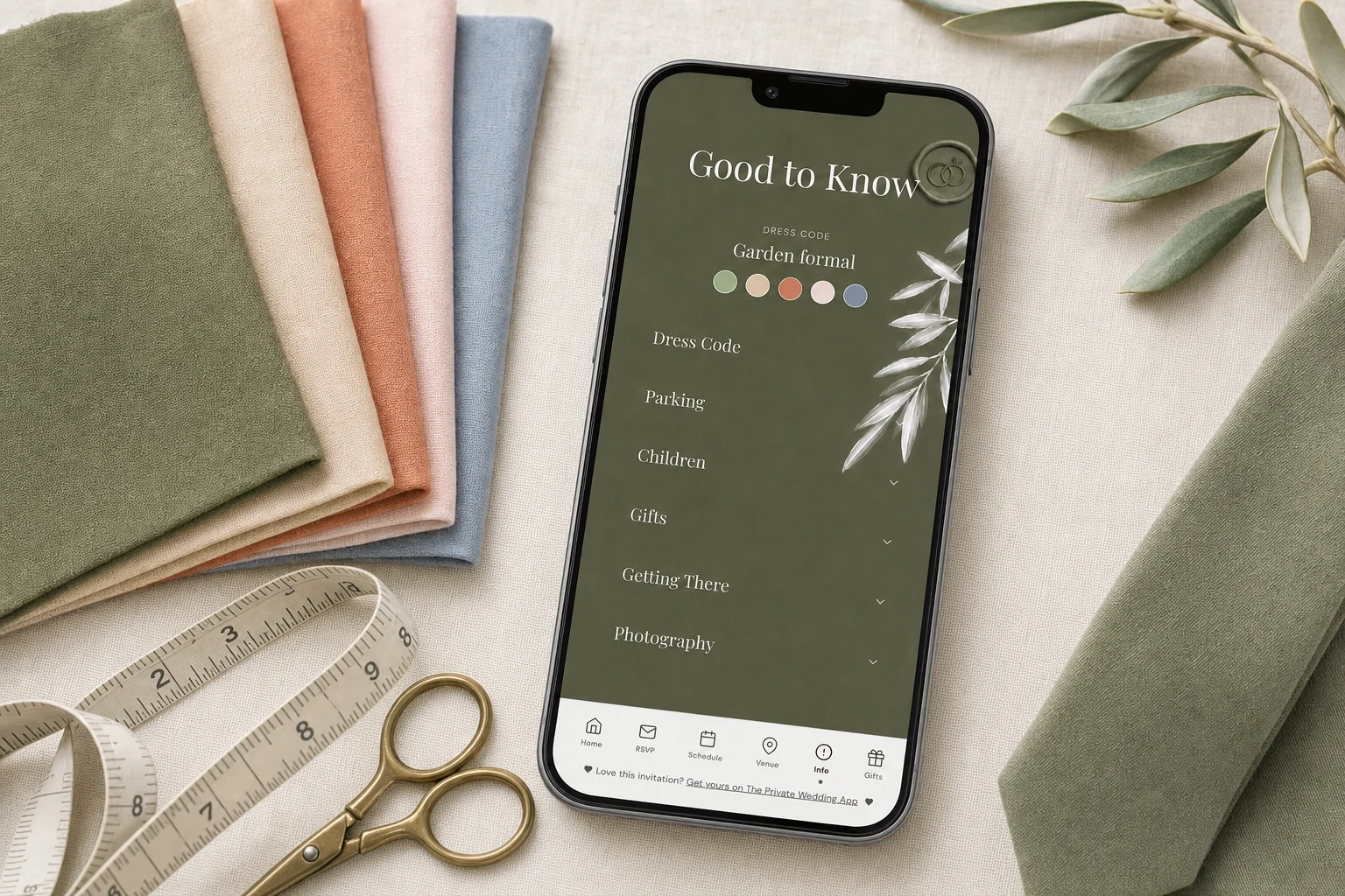 Wedding guest dress code color palette: a phone shows the invitation's Good to Know page with the Garden formal dress code and five color swatches, next to fabric swatches in sage, sand, terracotta, blush and dusty blue